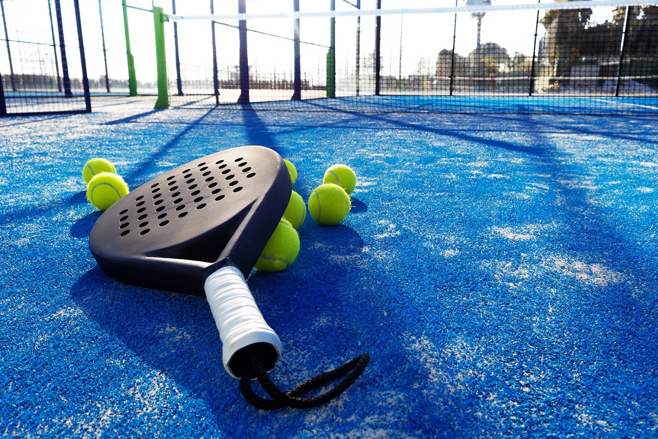 Paddle racket with balls paddle training on the court.