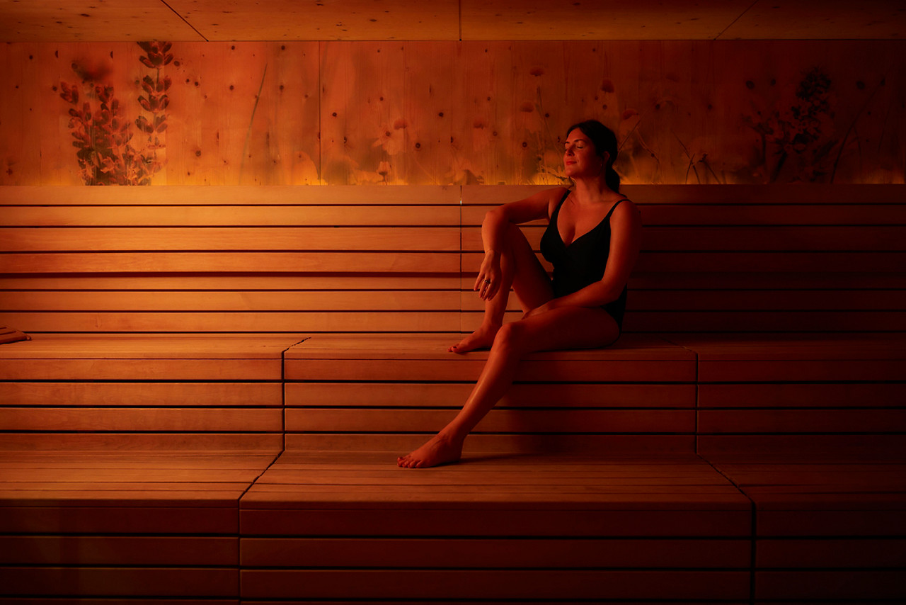 Two ladies in the forest glade steam room