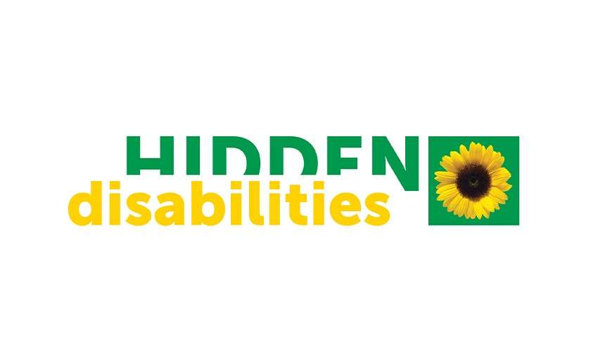 Logo shows “HIDDEN disabilities” with a sunflower icon in a green square to the right; green “HIDDEN,” yellow “disabilities,” on a plain white background.