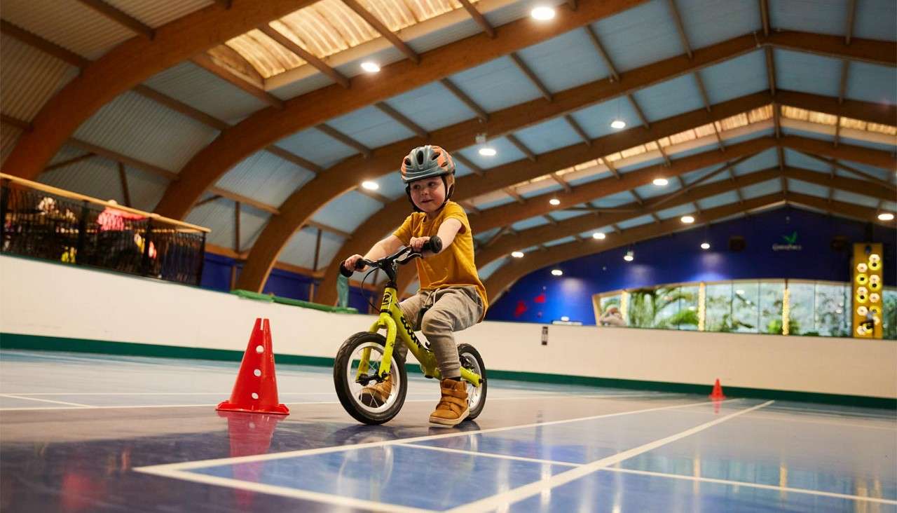 Young boy on a balance bike
